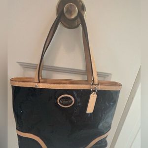 Coach Black patent leather w/ leather straps & accents. Purchased new from Coach